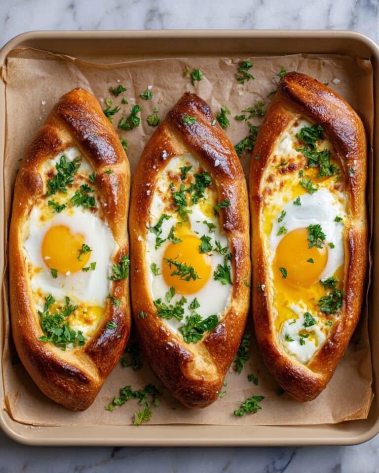 Authentic Georgian Khachapuri with Cheesy Filling and Baked Egg Recipe