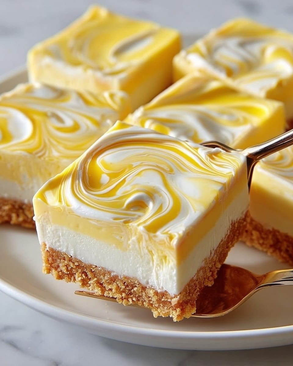A close-up image of square dessert pieces with three distinct layers placed on a white plate over a white marbled texture. The bottom layer is a crumbly, golden-brown crust with a rough texture. Above it is a thin, smooth white layer, topped by a thicker creamy layer that has a marbled swirl pattern of yellow and white spun in an artistic rose-like design. The dessert is cut into neat squares, with one piece slightly lifted by a metal fork showing the three layers clearly. Photo taken with an iphone --ar 4:5 --v 7