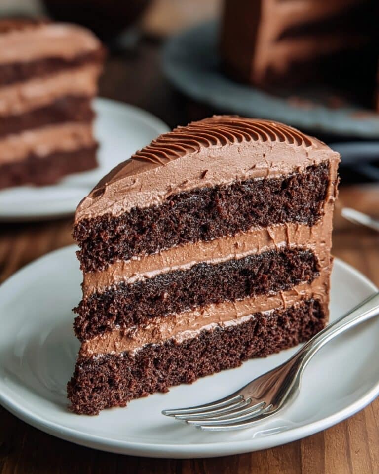 Decadent Chocolate Mousse Cake with Raspberries Recipe